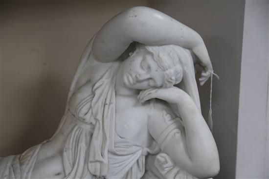 After Georges Marie Valentin Bareau (French 1886-1931). A marble figure of Cleopatra reclining, height 20in. length 32in.